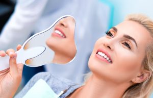woman happy with dental care